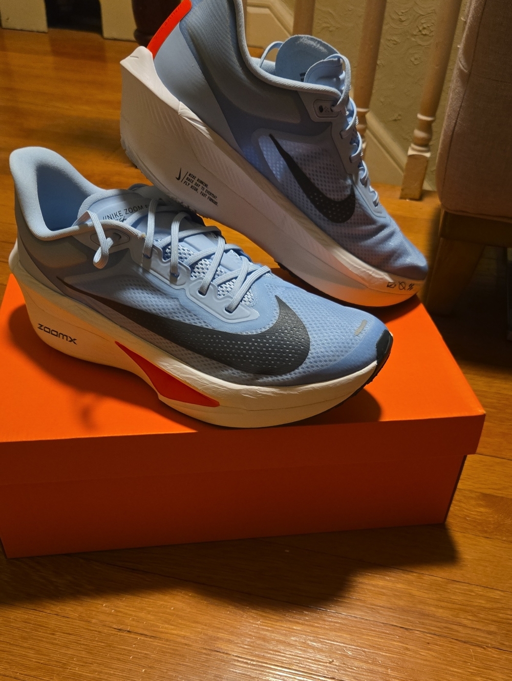 Nike Men's Light Blue Zoom Fly 6 Sneakers with Red Accents